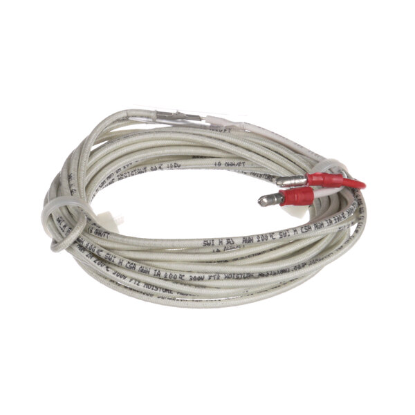 A white Master-Bilt door heater cable with red connectors.