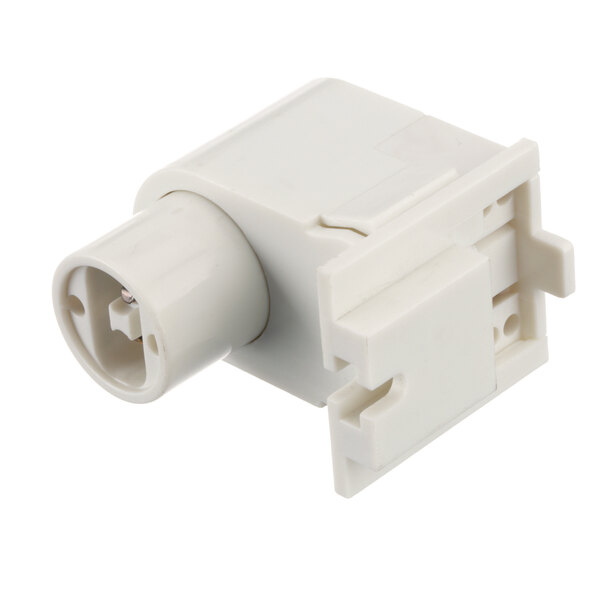 A close-up of a white plastic socket with a white cover.