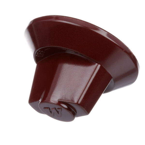 A brown plastic Vulcan convection oven knob with a set screw.