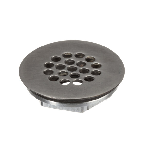 A metal Groen sink drain fitting with holes in it.