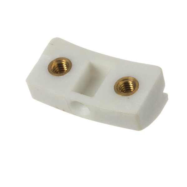 A white plastic Hobart shoe adjustment connector with gold screws.