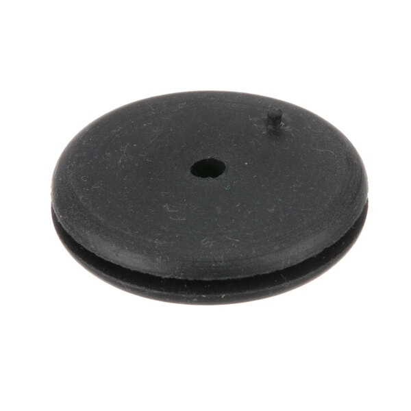 A black round rubber Hobart grommet with a hole in it.