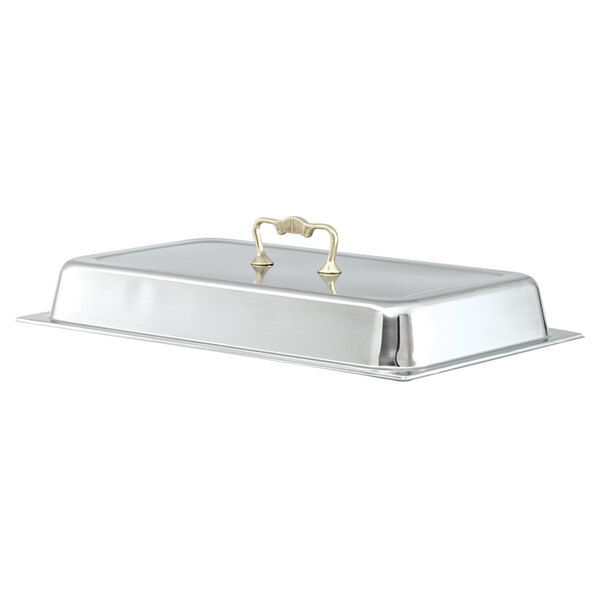 A Vollrath brass chafer cover on a silver tray with a handle.