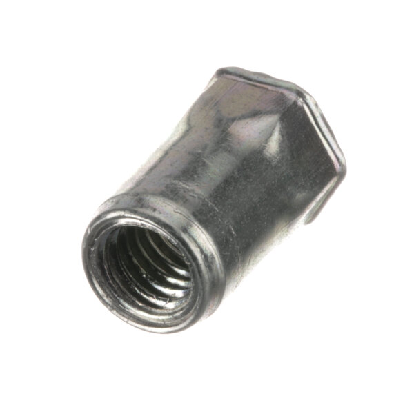 A close-up of a metal nut with black threading.