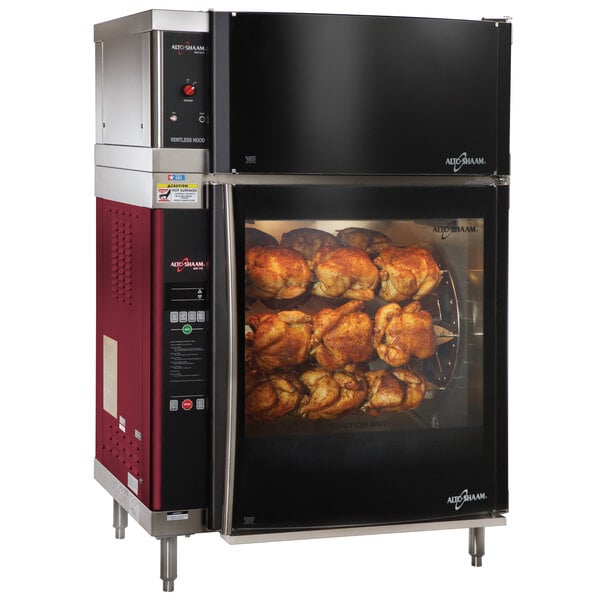 An Alto-Shaam rotisserie oven with chicken inside.