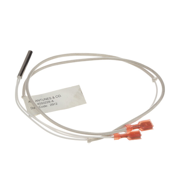 A white cable with orange clips and a connector.