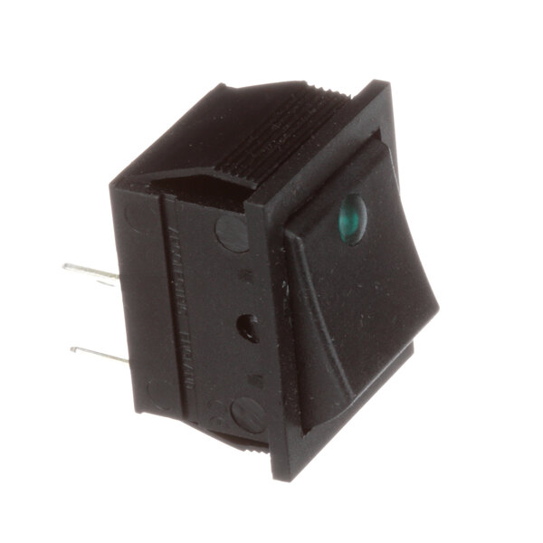 A black square switch with a green light.