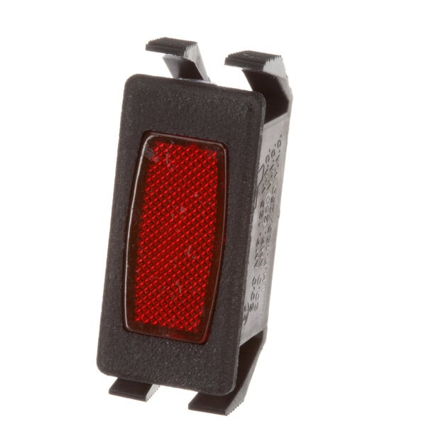 A red light on a black device.