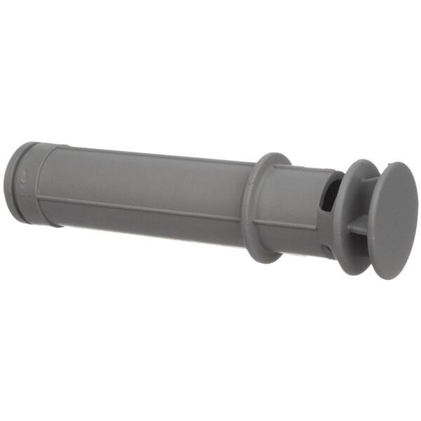 A grey plastic pipe with a round cap and metal end.
