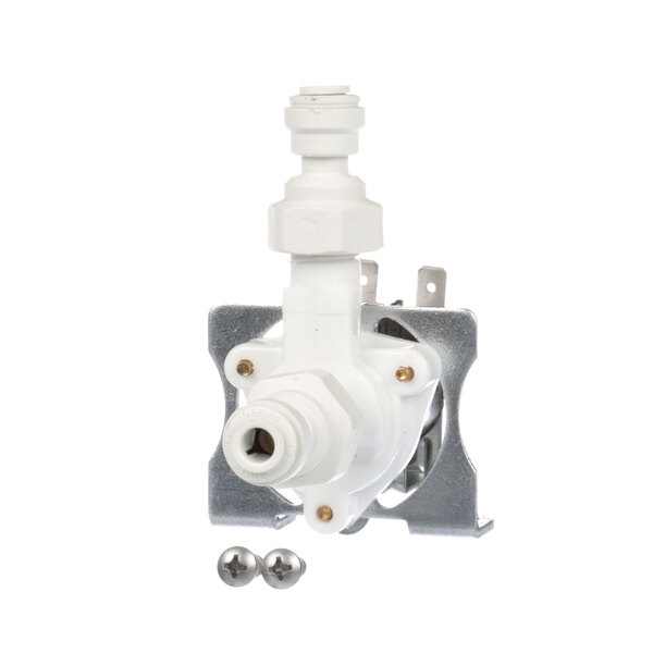 A white Follett Corporation solenoid water valve with a white plastic part.