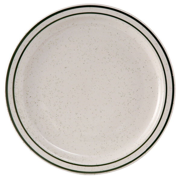 A white Tuxton china plate with a narrow rim and black speckled green stripe.