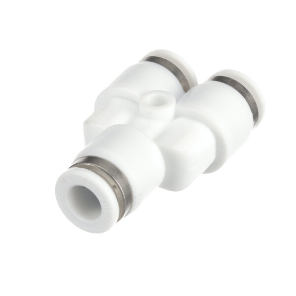 A white plastic Franke Fast Coupling with metal inserts.