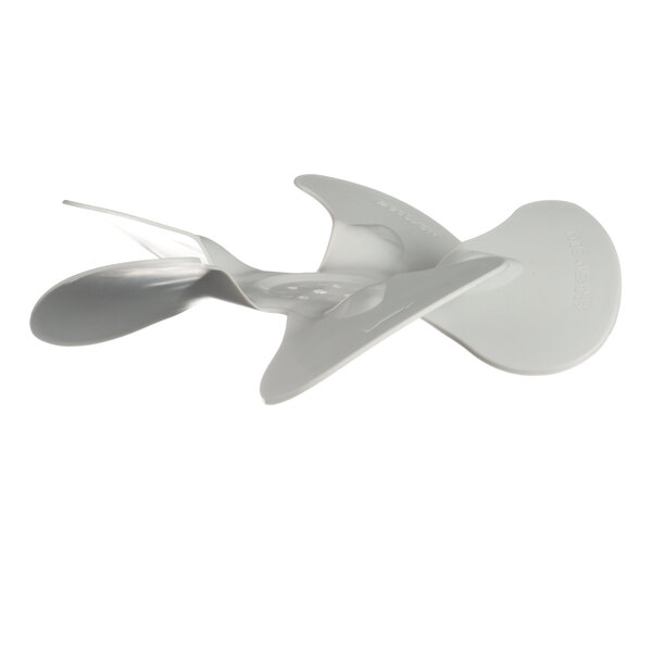 A white plastic propeller with holes.