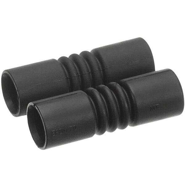 A pair of black plastic bushing drip collectors.