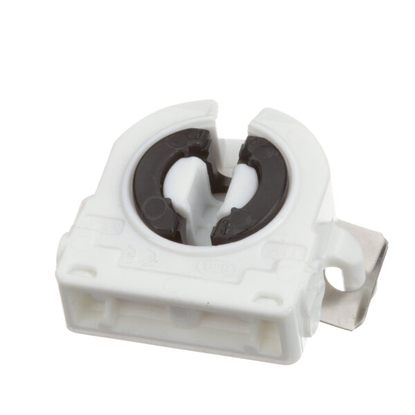 A white plastic Beverage-Air socket with black rings.