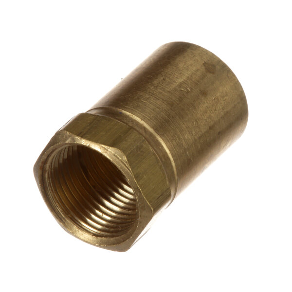 A close-up of a brass nut on a brass pipe.