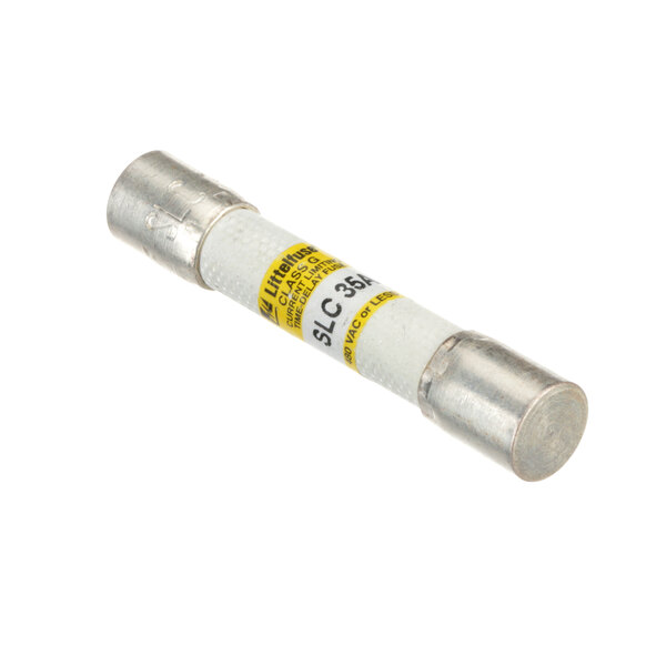 A close-up of a white and yellow Stero electrical fuse with a metal tube.