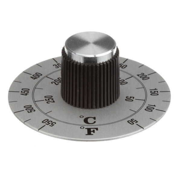 A close-up of a black and silver Lincoln temperature knob.