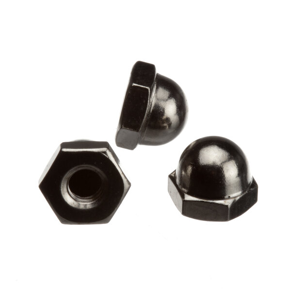 A group of three black Vollrath nuts.