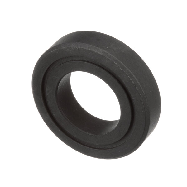 A close-up of a black rubber bearing seal.