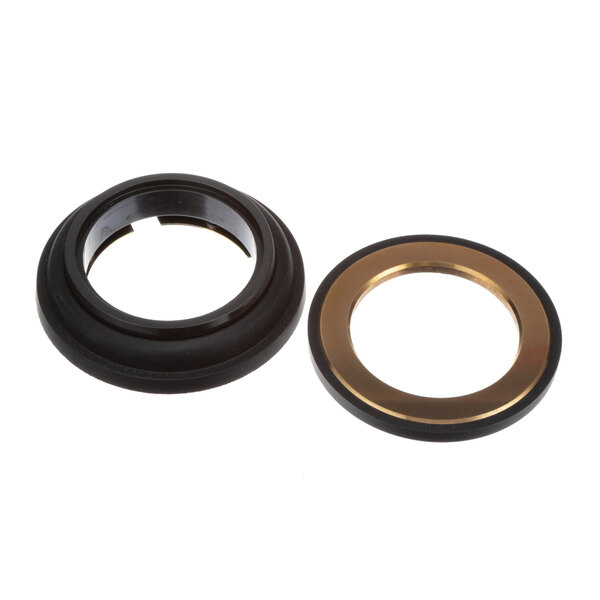 A black and gold rubber gasket with a black and gold metal ring.
