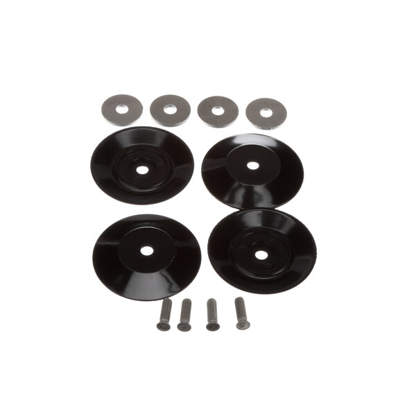 A group of black discs with screws.