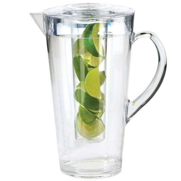 A Cal-Mil polycarbonate pitcher filled with water and lime slices.