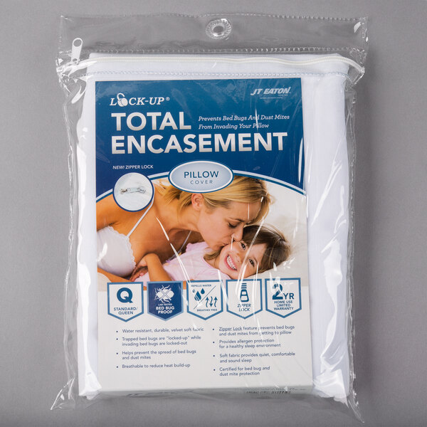 A package of white JT Eaton bed bug proof pillow protectors with a zipper.