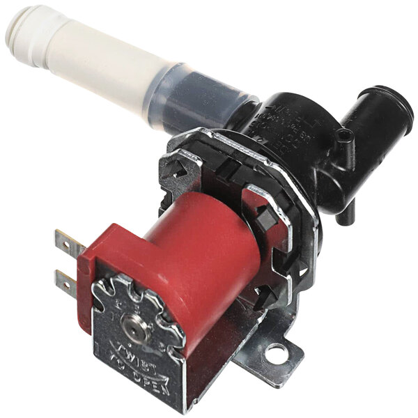 A close up of a red and black Follett Horizon Drain Valve Kit with a white plastic tube.