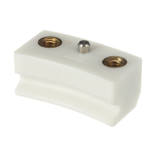 A white plastic block with two screws used to connect Hobart mixer parts.