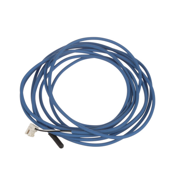 A blue wire with a white connector on a Delfield commercial refrigeration control board.