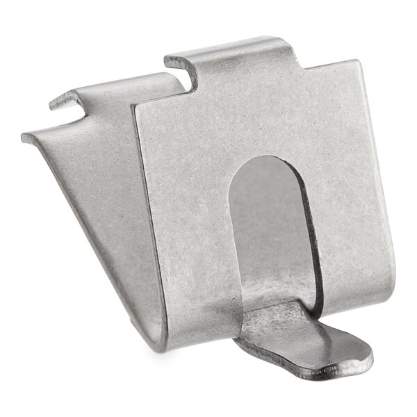 A Traulsen metal shelf clip with a hole in it.