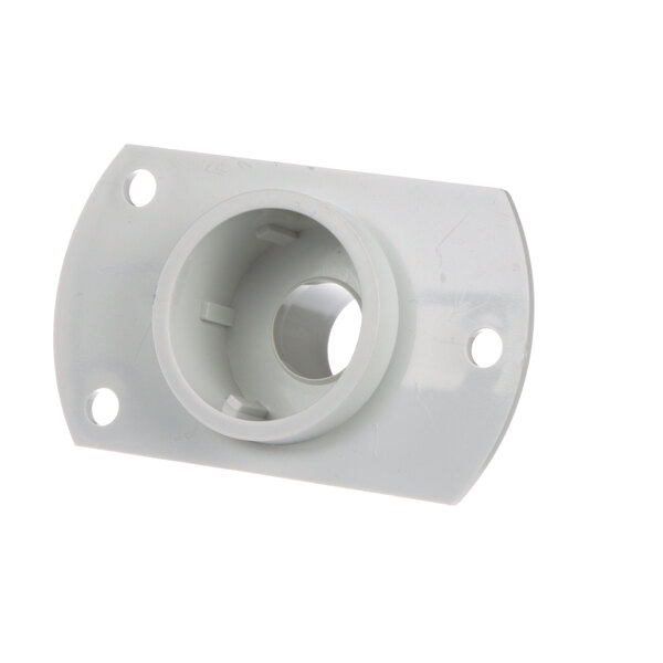 A white plastic Hoshizaki valve housing with holes in it.