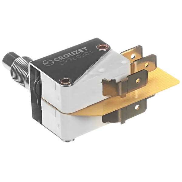 A Bizerba Micro Switch with a metal cover and silver and gold metal components.