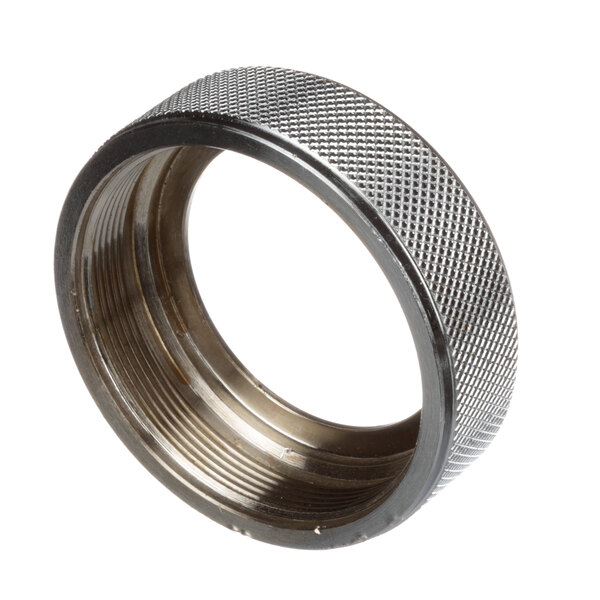 A chromed threaded nut with a sight glass and a mesh insert.
