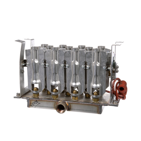 A metal Blodgett boiler burner assembly with four pipes.