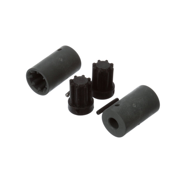 A set of three black rubber plugs inside a black plastic cylinder.