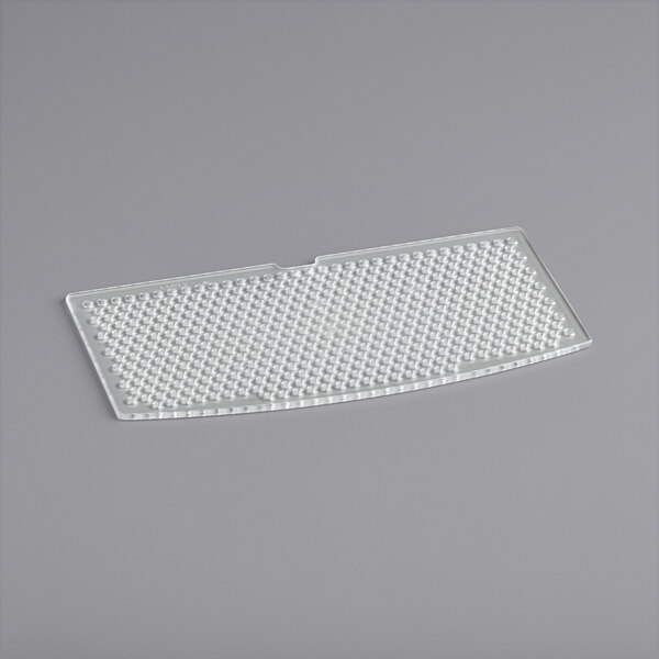 A white plastic mesh filter with dots.