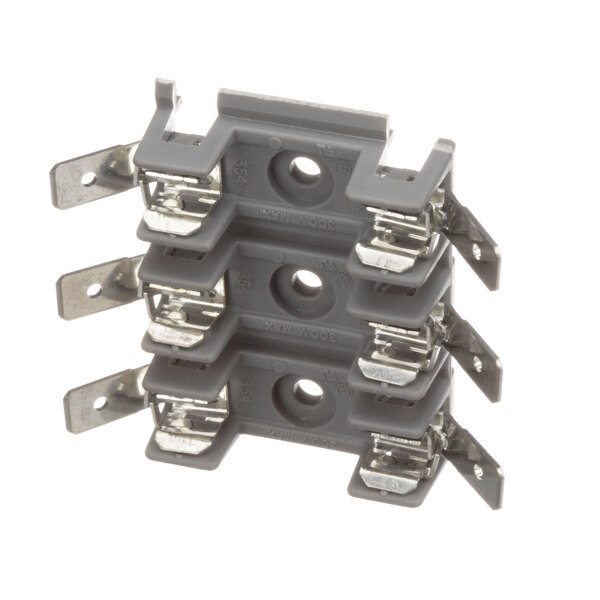 A stack of grey plastic Cleveland fuse holders with three metal terminals.
