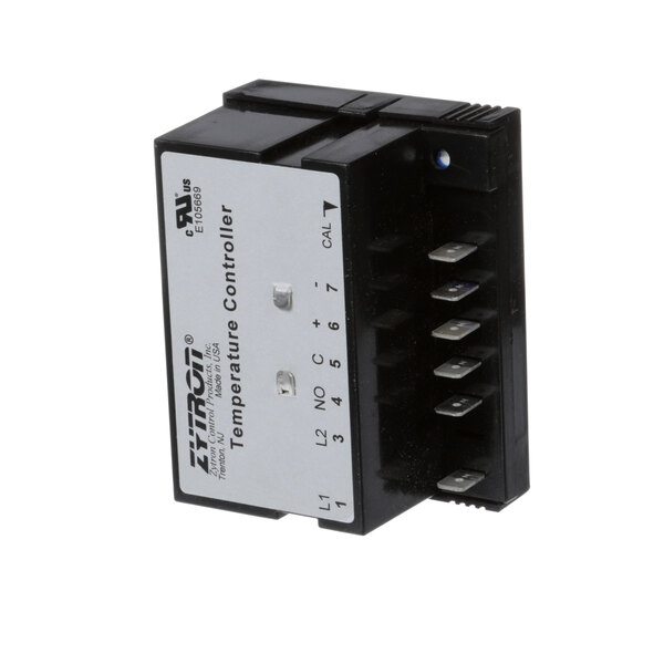 A white power supply module for a black and white Wells Temp Controller.