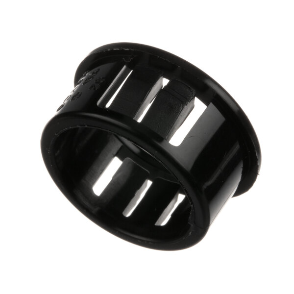 A black plastic Groen bushing with holes.