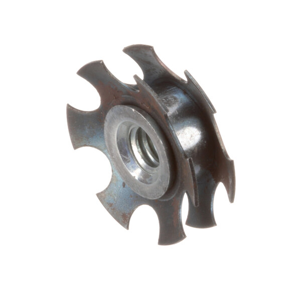 A metal wheel with a hole in it and a metal star with a nut.
