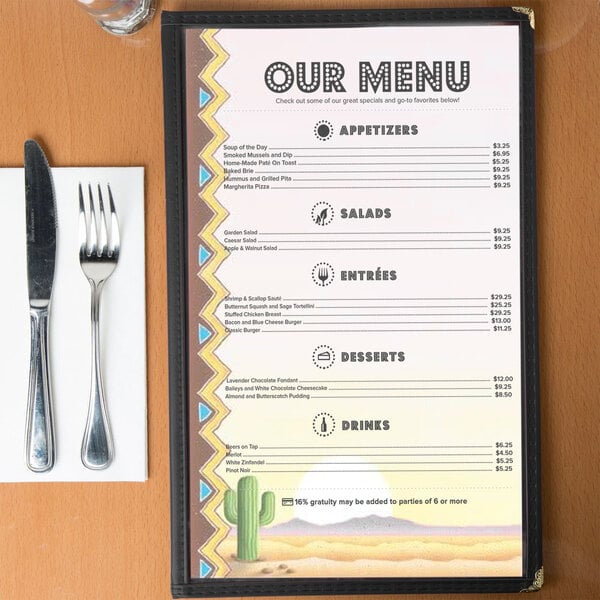 Menu insert with a cactus design on a table with a knife and fork.