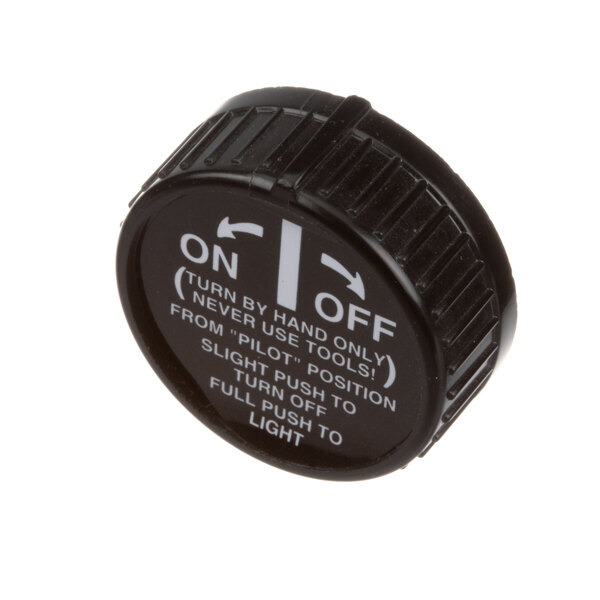 A close-up of a black plastic knob with the words "on" and "off" in white.