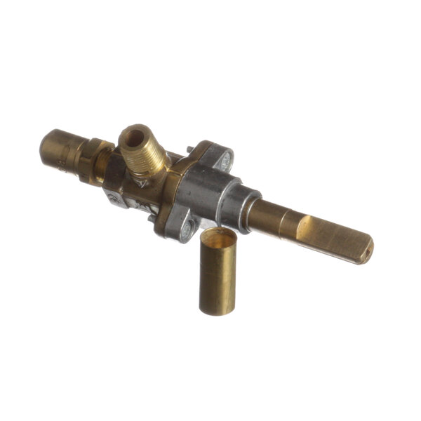 A metal and brass Garland top burner valve with nozzles.
