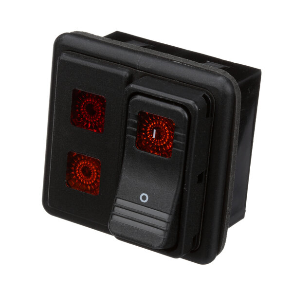 A black rectangular Vulcan electric kettle switch with red lights.