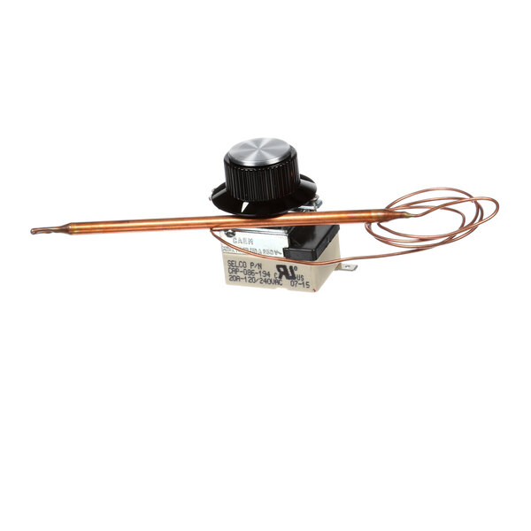 A Lockwood thermostat with a copper wire attached to it.