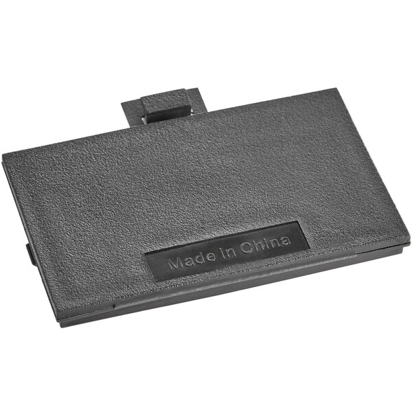 A black rectangular battery cover with a metal clip.