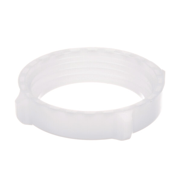 A white plastic ring with a hole in it.