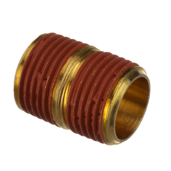 A close-up of a brass Cleveland nipple with a red and gold finish.